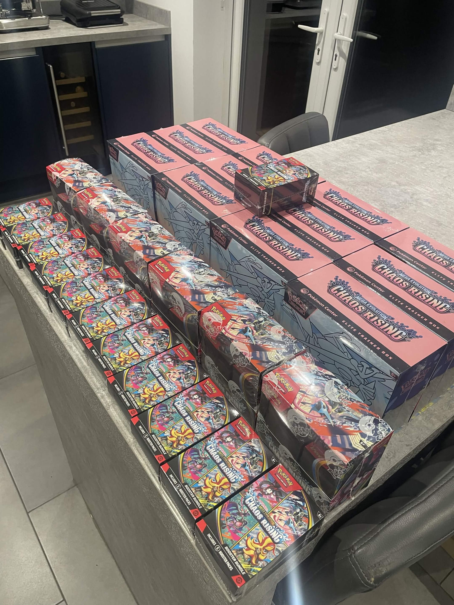 Chaos Rising ETB haul on kitchen table